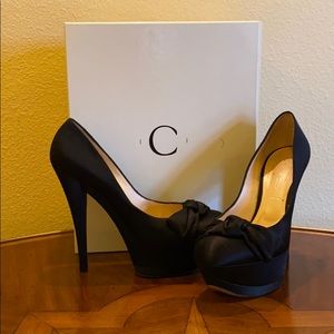 Exclusive Casadei luxury satin 6” platform heels.